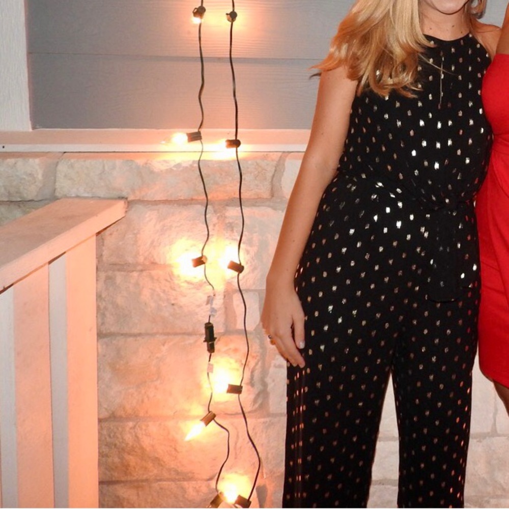 Black jumpsuit wIth gold detailing
